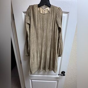 Michael Kors pleated long sleeve mini dress
Size Small
Excellent condition